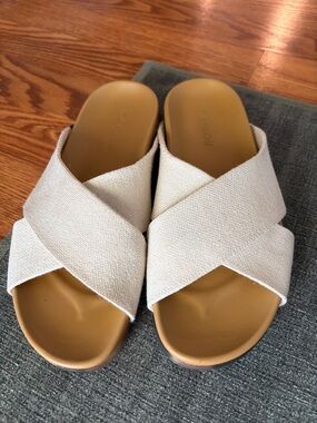 Rothy's Crisscross Slide Mules in Cream and Tan